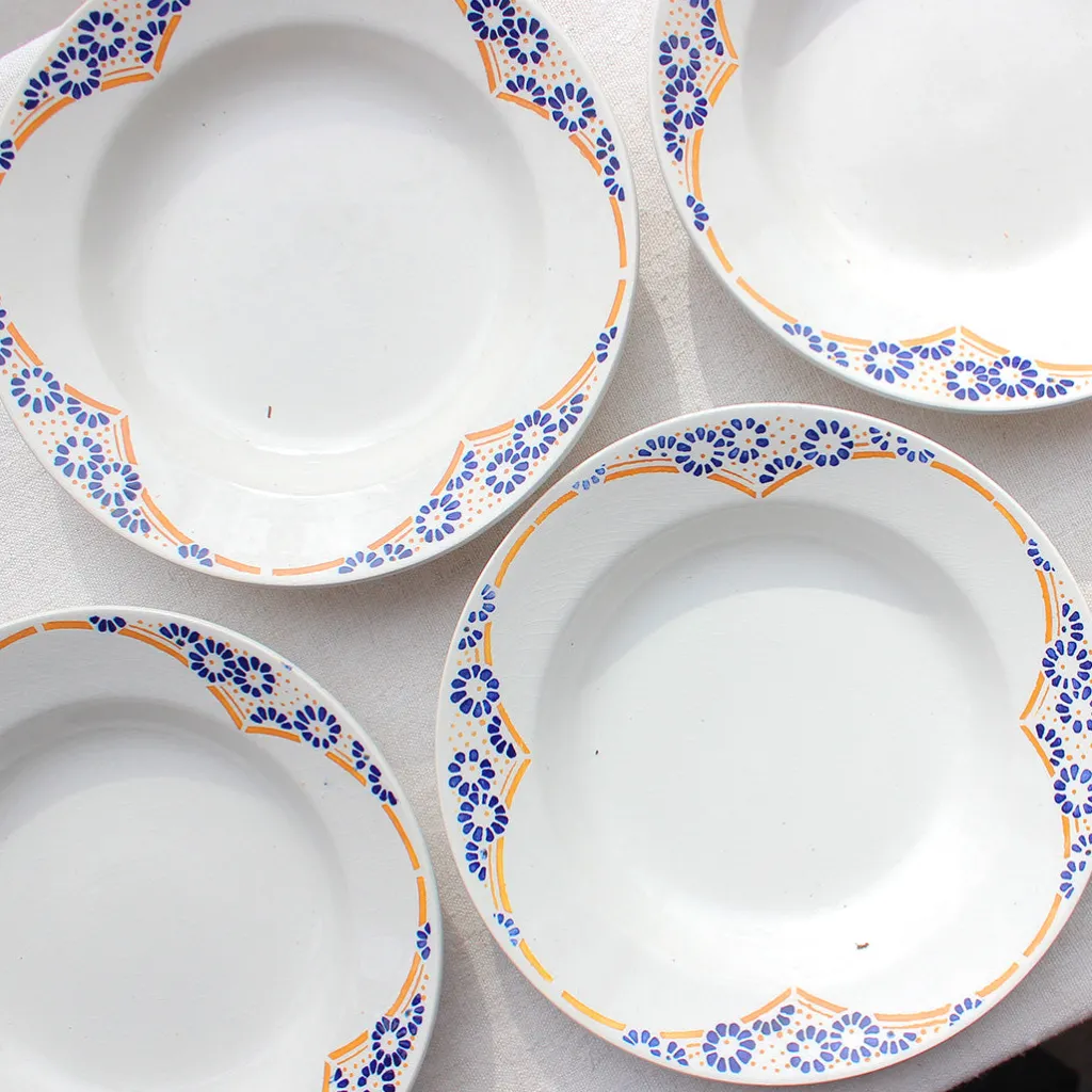 Gien 8 assiettes creuses aux marguerites bleues